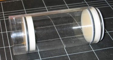 Tube with piston